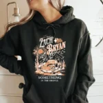 The Story Behind Zach Bryan Must Have Merch Hoodie